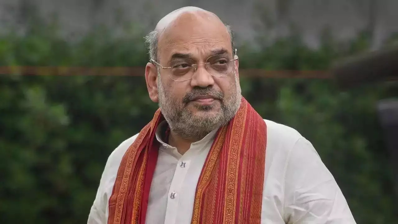 amit shah slams congress over pok issue also hits back on arvind kejriwal 1