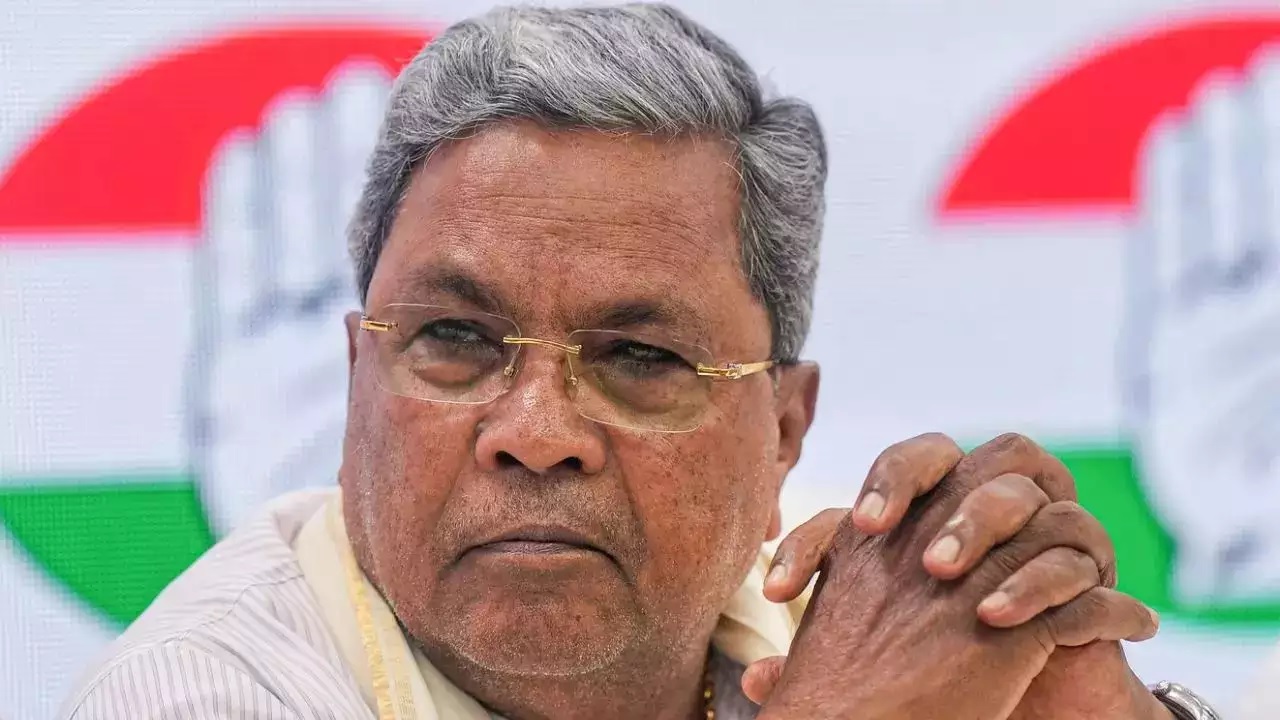 karnataka news cm siddaramaiah calls land scam a conspiracy og bjp 1