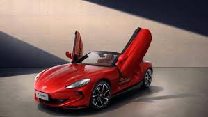 mg electric sports car cyberster launching in india january 2025 auto expo event design features scissor doorsioyu