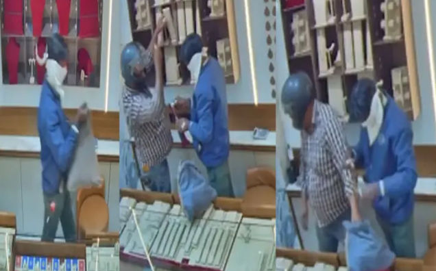 ahmedabad jewellery showroom robbed at gunpoint in broad daylight in bhopalewt4w6tw45