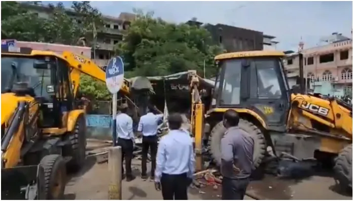 bulldozer action threat on many illegal religious structures in gujarat2